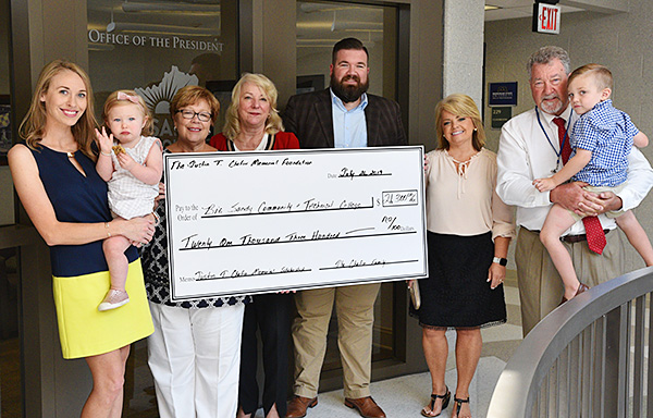 The family of Justin T. Chafin presenting scholarship funds to President Sherry Zylka, CEO of Big Sandy Community & Technical College