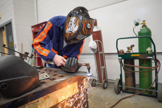 Student with welding